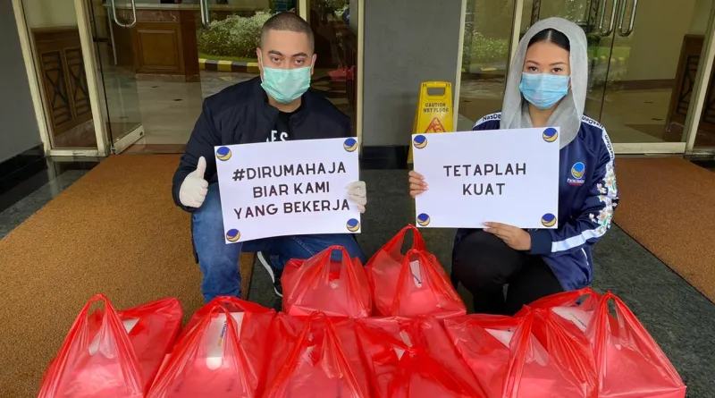 Read more about the article Dampak Covid-19, NasDem Jakarta Gelar Peduli Ojol